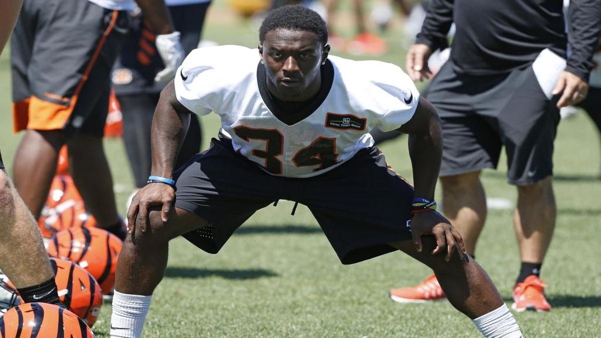 Stanley “Boom” Williams, (34), stretches during an Organized Team Activity at Paul Brown Stadium in Cincinnati on Tuesday, June 6, 2017. The former UK star will try to make the Bengals as an undrafted free agent when training camp starts Friday.