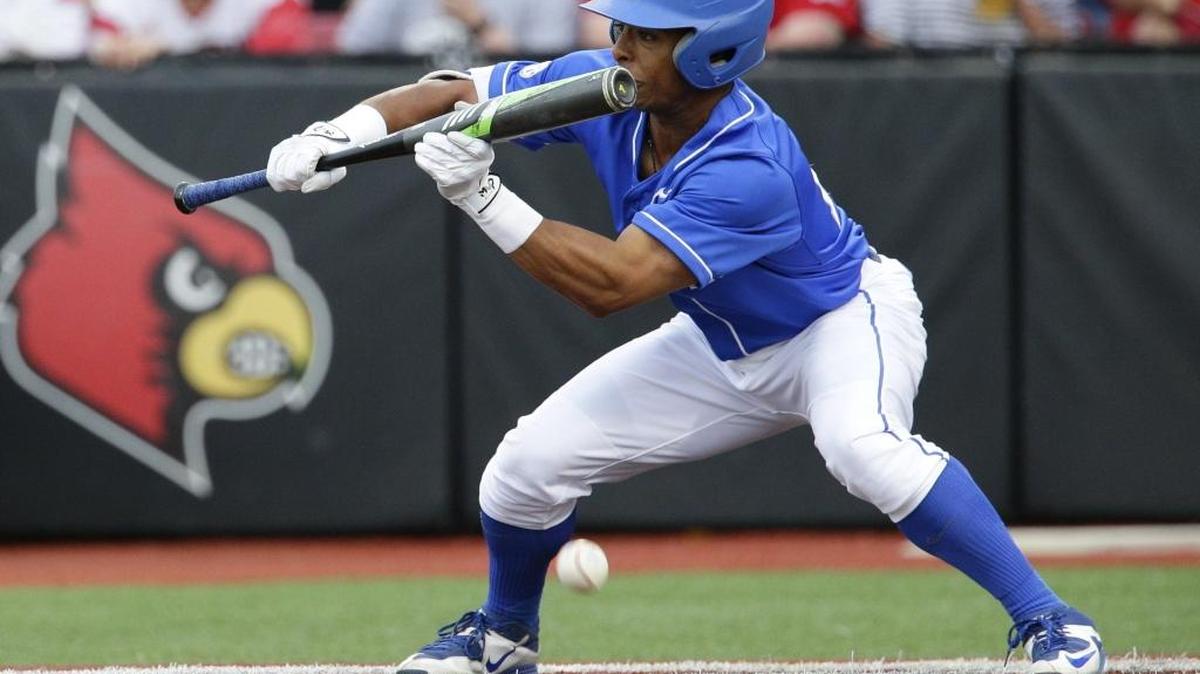 Kentucky outfielder Marcus Carson (15) laid down a perfect bunt that fell still just inside the third baseline as Louisville defeated Kentucky 7-6 on Tuesday April 19, 2016 in Louisville, Ky.