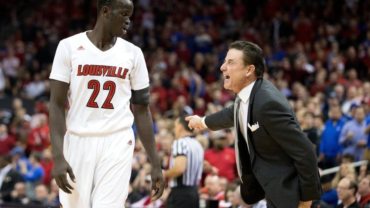 Louisville head coach Rick Pitino yells instructions to forward Deng Adel (22) during the game with the Kentucky at the KFC Yum! Center on Dec. 21, 2016. Louisville won 73-70.
