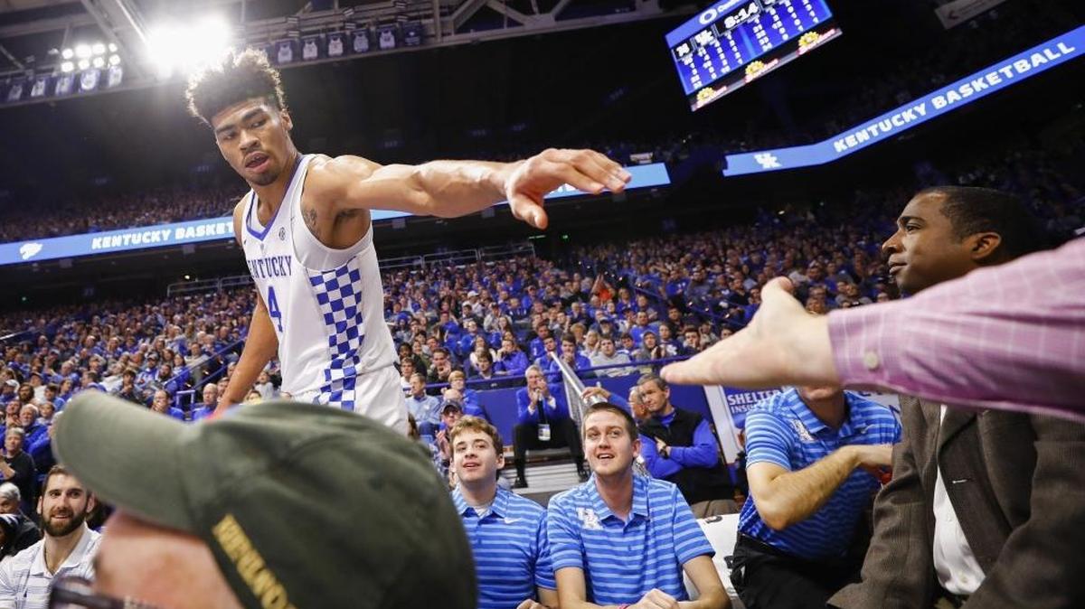 Kentucky forward Nick Richards (4) high fives a fan during UK’s 86-67 win over the Fort Wayne Mastodons at Rupp Arena in Lexington, Ky., Wednesday, Nov. 22, 2017.