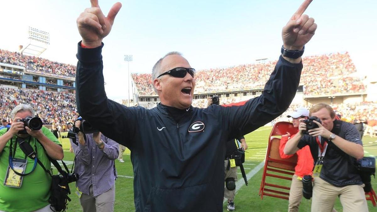Georgia head coach Mark Richt celebrates a 13-7 victory against Georgia Tech on Saturday, Nov. 28, 2015, at Bobby Dodd Stadium in Atlanta.