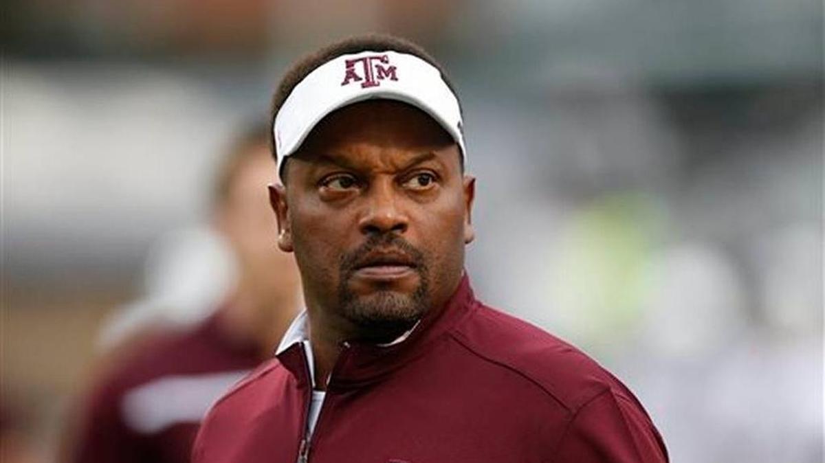 In this Saturday, Oct. 24, 2015 file photo, Texas A&M head coach Kevin Sumlin looks at the score board prior to their NCAA college football game against Mississippi in Oxford, Miss. Texas A&M coach Kevin Sumlin goes into the Music City Bowl down to his third option at quarterback with Kyle Allen and Kyler Murray deciding to transfer away from the Aggies.