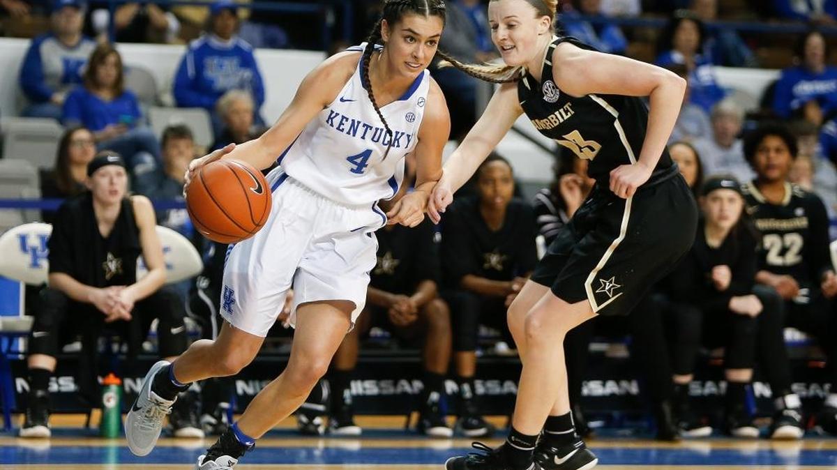 Kentucky guard Maci Morris (4) drives to the basket against Vanderbilt guard Minta Spears (23) during the first half of UK’s 71-63 win at Memorial Coliseum in Lexington, Ky, on Sunday, February 5, 2017.