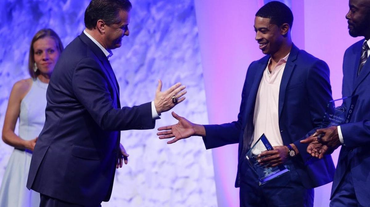 UK basketball coach John Calipari won Coach of the Year award and immediately gave it to Tyler Ulis during the Catspy Awards on Monday April 25, 2016 in Lexington, Ky.