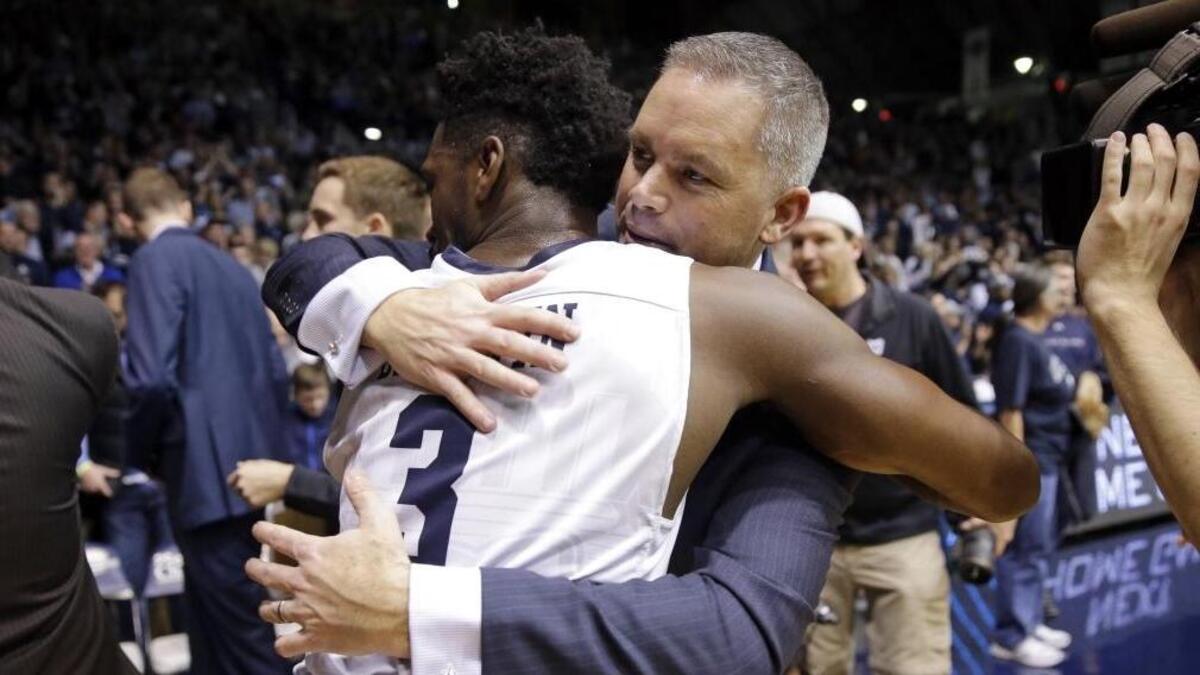 Butler head coach Chris Holtmann hugs guard Kamar Baldwin (3) following a 66-58 win over Villanova in an NCAA college basketball game in Indianapolis, Wednesday, Jan. 4, 2017. Holtman is now the coach at Ohio State.