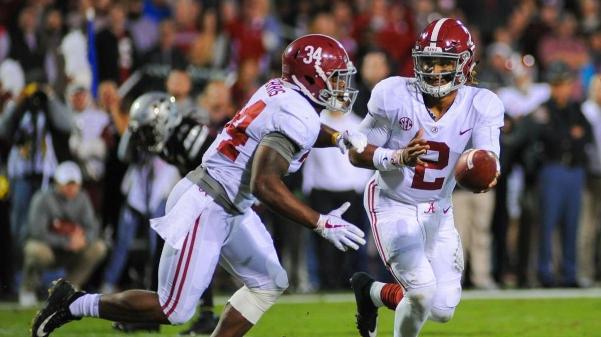 Alabama quarterback Jalen Hurts (2) hands off to running back Damien Harris (34) during the Crimson Tide’s win over Mississippi State on Nov. 11, 2017 in Starkville, Miss. Alabama will play Clemson in the Sugar Bowl as part of the College Football Playoff.