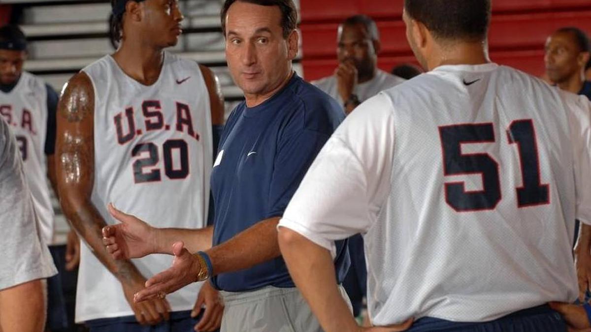 Mike Krzyzewski, head Coach of the USA Basketball Men’s Senior National Team talks with Deron Wiliams during training camp on August 16, 2007 at Valley High School in Las Vegas, Nevada.