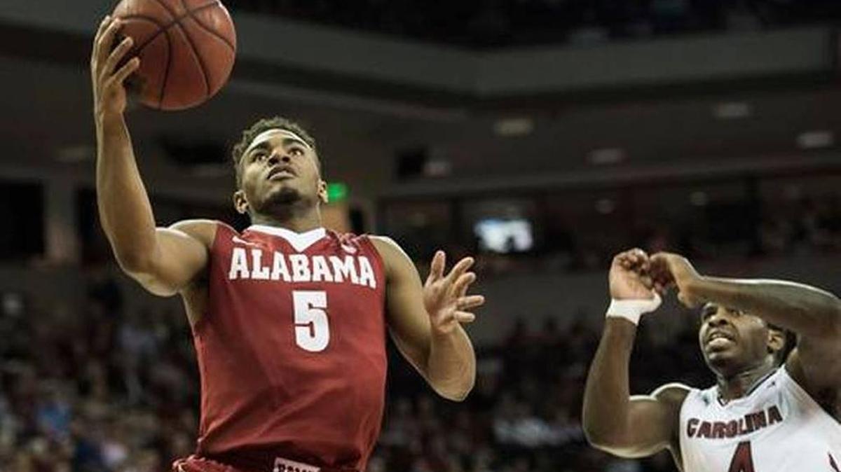 Alabama guard Avery Johnson Jr. drives to the basket against South Carolina guard Rakym Felder in Bama’s 90-86 four overtime win on Tuesday, Dec. 7, 2017. Johnson scored a career-high 23 points in the win.