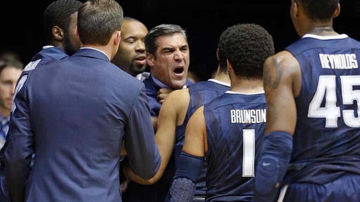 Villanova head coach Jay Wright is restrained by playes after receiving a technical foul in the first half of his team’s loss at Butler in Indianapolis, Wednesday, Jan. 4, 2017. The No. 1-ranked Wildcats return to action Saturday night against visiting Marquette.
