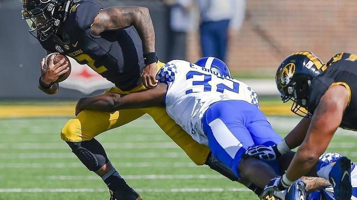 Kentucky linebacker Eli Brown tackles Missouri quarterback Marvin Zanders during UK’s 35-21 win over the Tigers in Columbia, Mo. on Saturday, Oct. 29, 2016.