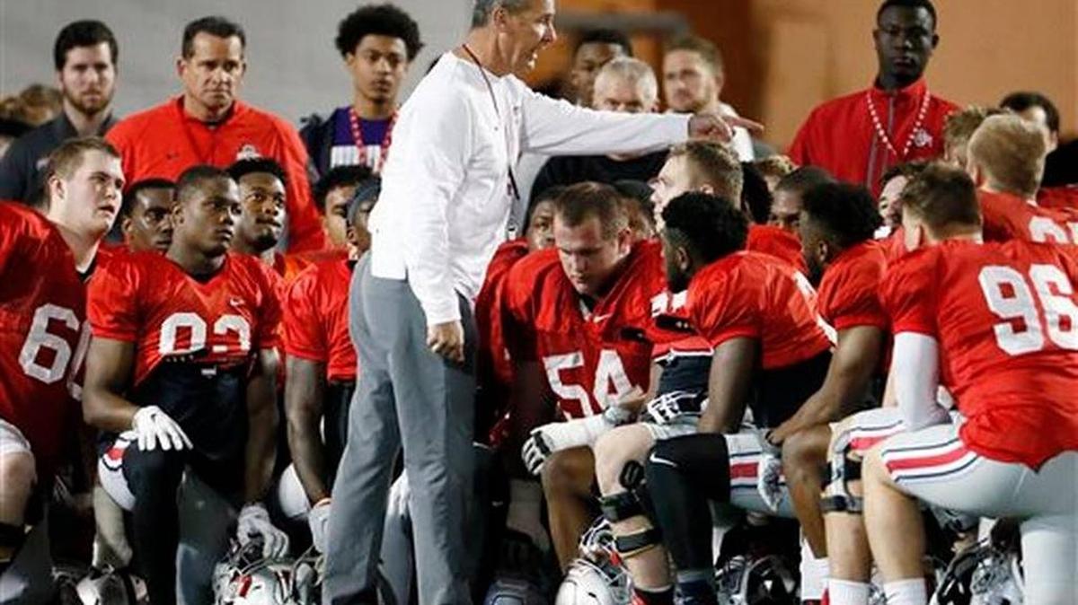 Ohio State football head coach Urban Meyer talks to his team during an NCAA college spring practice at the Woody Hayes Athletic Center in Columbus, Ohio, Tuesday, March 22, 2016.