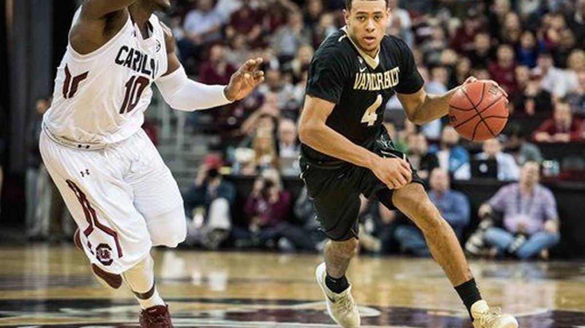 Vanderbilt guard Wade Baldwin IV (4) pushes the ball down court against South Carolina guard Marcus Stroman (10) during the first half of an NCAA college basketball game Saturday, Jan. 9, 2016, in Columbia, S.C.