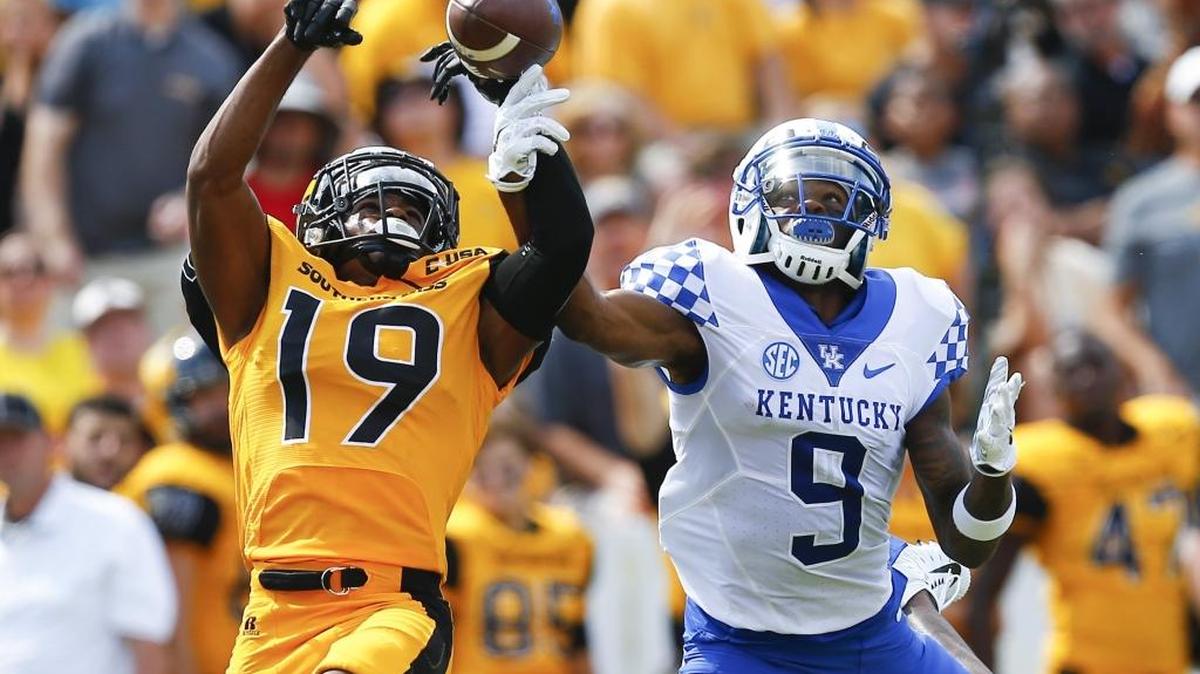 Southern Miss defensive back Curtis Mikell (19) breaks up a pass intended for Kentucky wide receiver Garrett Johnson (9) during UK’s 24-17 win at M.M. Roberts Stadium in Hattiesburg, Miss., Saturday, Sept. 2, 2017.