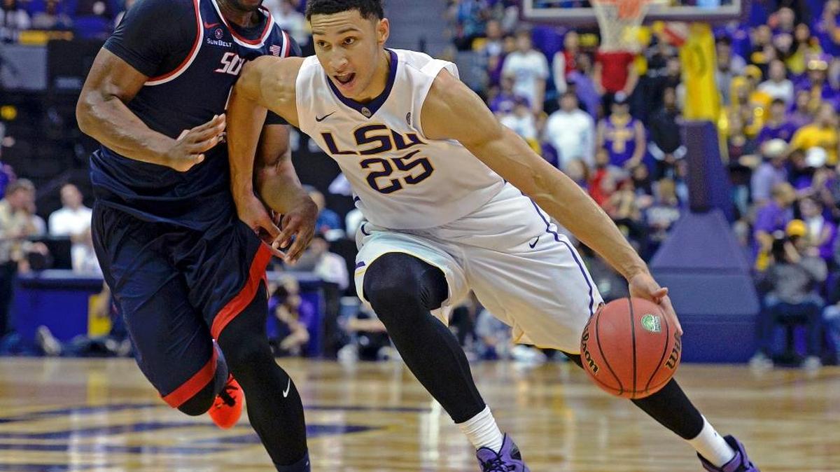 LSU forward Ben Simmons (25) drives to the basket as South Alabama forward Don MuepoKelly (5) defends in the second half of an NCAA college basketball game in Baton Rouge, La., Thursday, Nov. 19, 2015. LSU won 78-66.