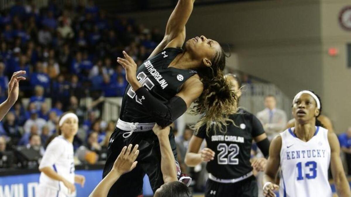 South Carolina Gamecocks guard Tiffany Mitchell (25) pulled a rebound over Kentucky Wildcats guard Taylor Murray (24) as #2 South Carolina defeated #9 Kentucky 73-62 on Thursday January 13, 2016 in Lexington, Ky.