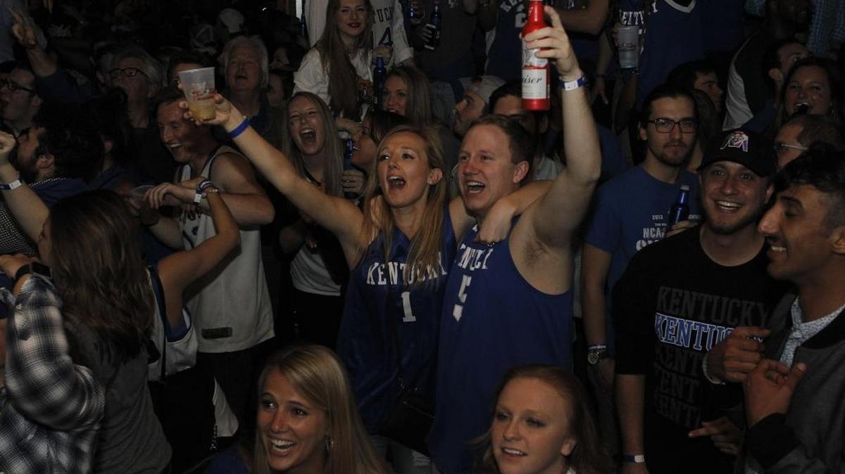 Fans react as they watched UK defeat UCLA 86-75 in the NCAA Sweet 16 at Tin Roof in Lexington, Ky., Friday, March 24, 2017.