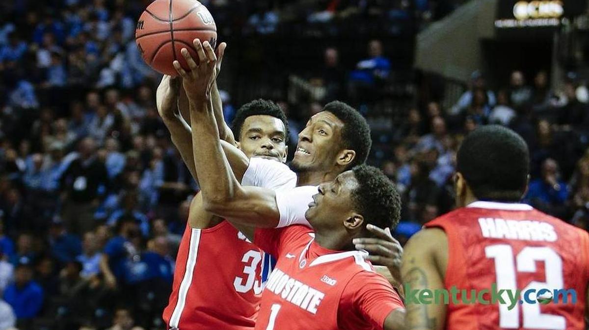 Kentucky Wildcats forward Marcus Lee (00) grabbed an offensive rebound in traffic as Kentucky played Ohio State.